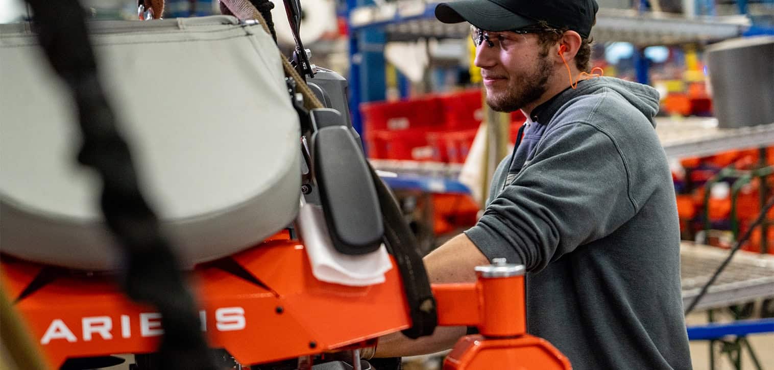 Ariens factory worker, working on assembling a brand new Zero-Turn mower