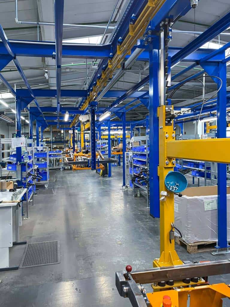 AS-Motor factory, new product line is open: AS 1000 Ovis EVO RC. Wide shot of the assembly line